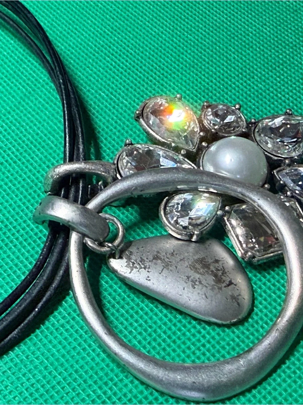 Silver Flower Pendant Necklace with Black Cord and Clear Accents